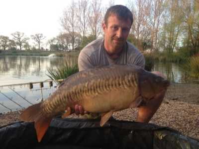 best uk fishing holidays - olivemead lake Pet Friendly Log Cabins with Fishing
